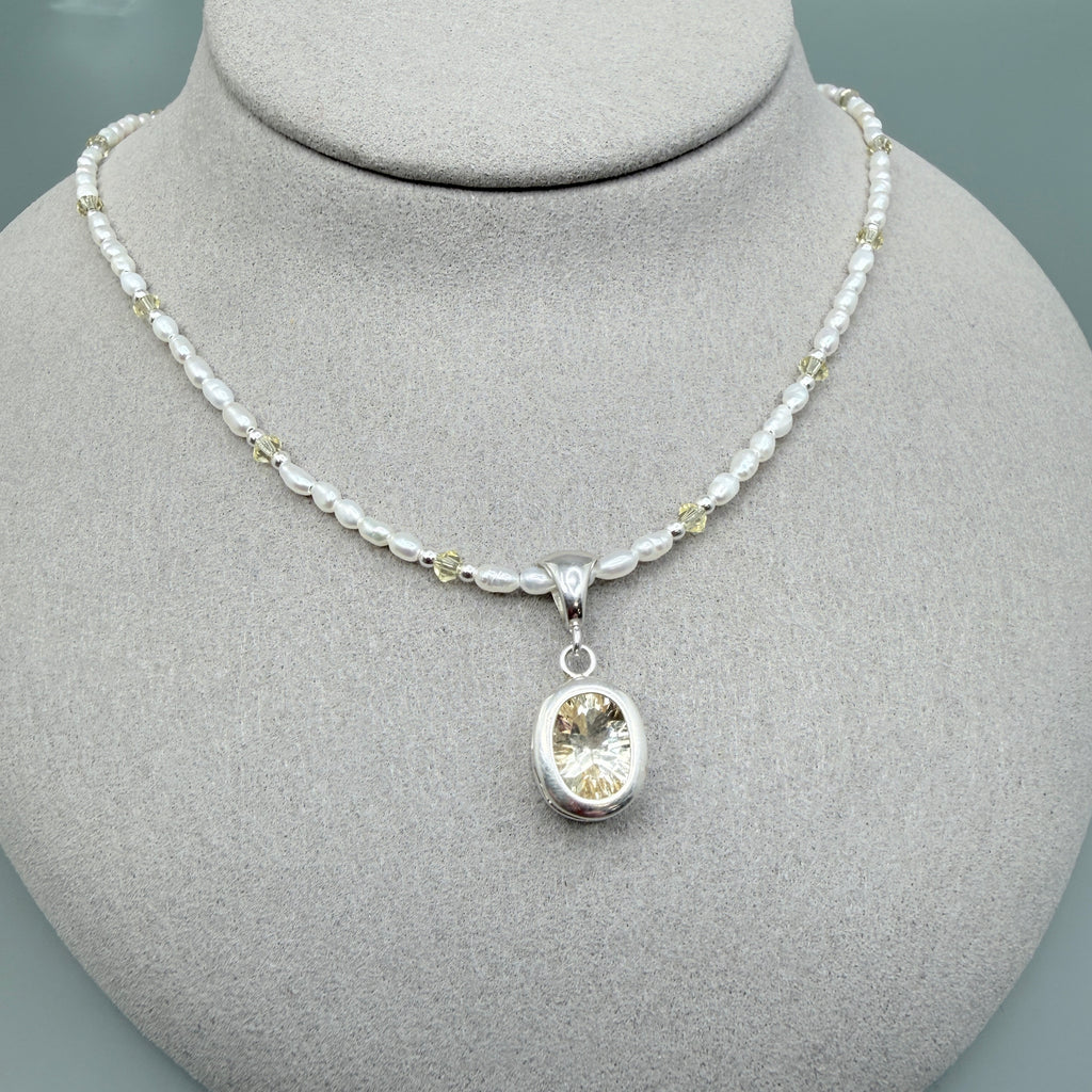 Pale yellow Labradorite with pearls and crystals