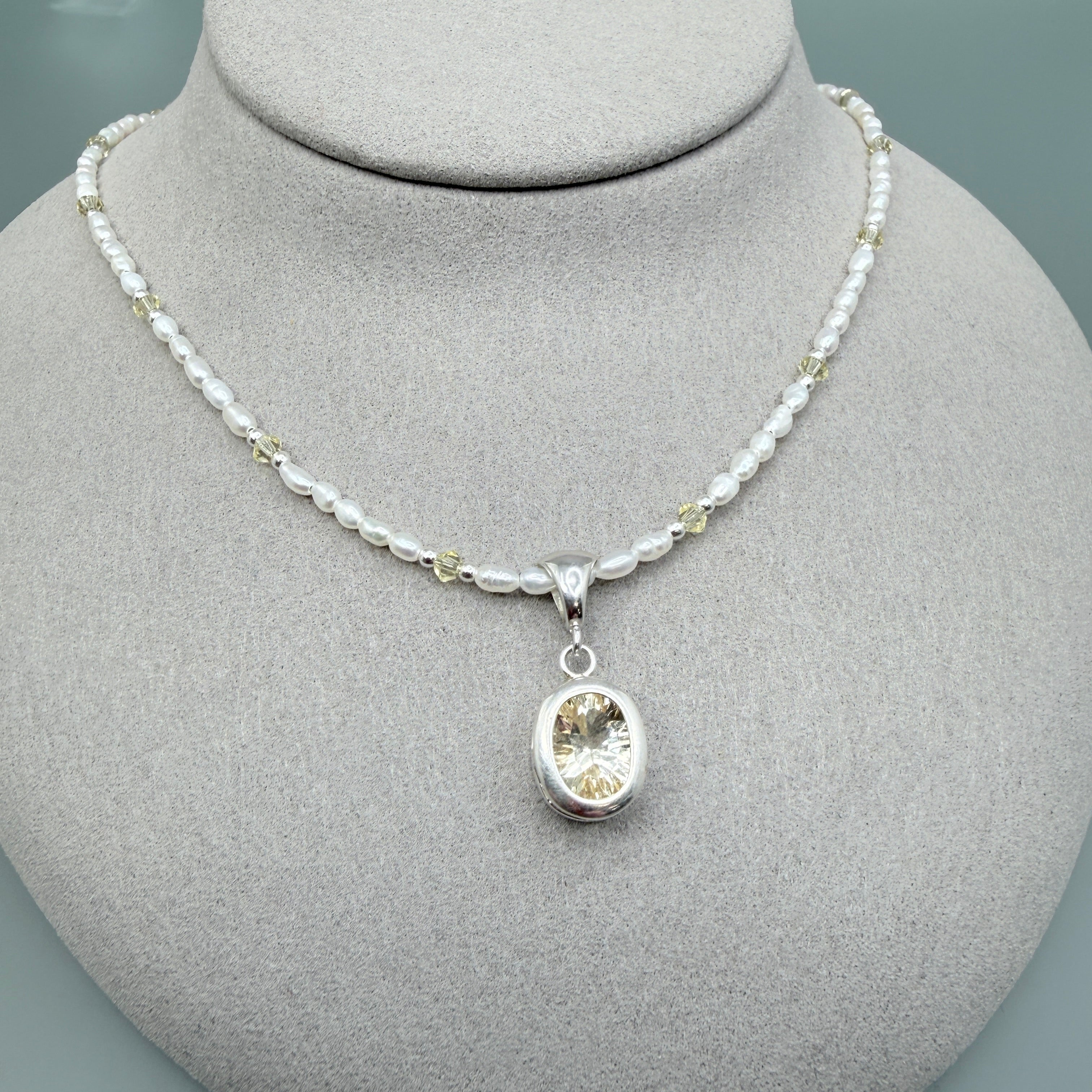 Pale yellow Labradorite with pearls and crystals