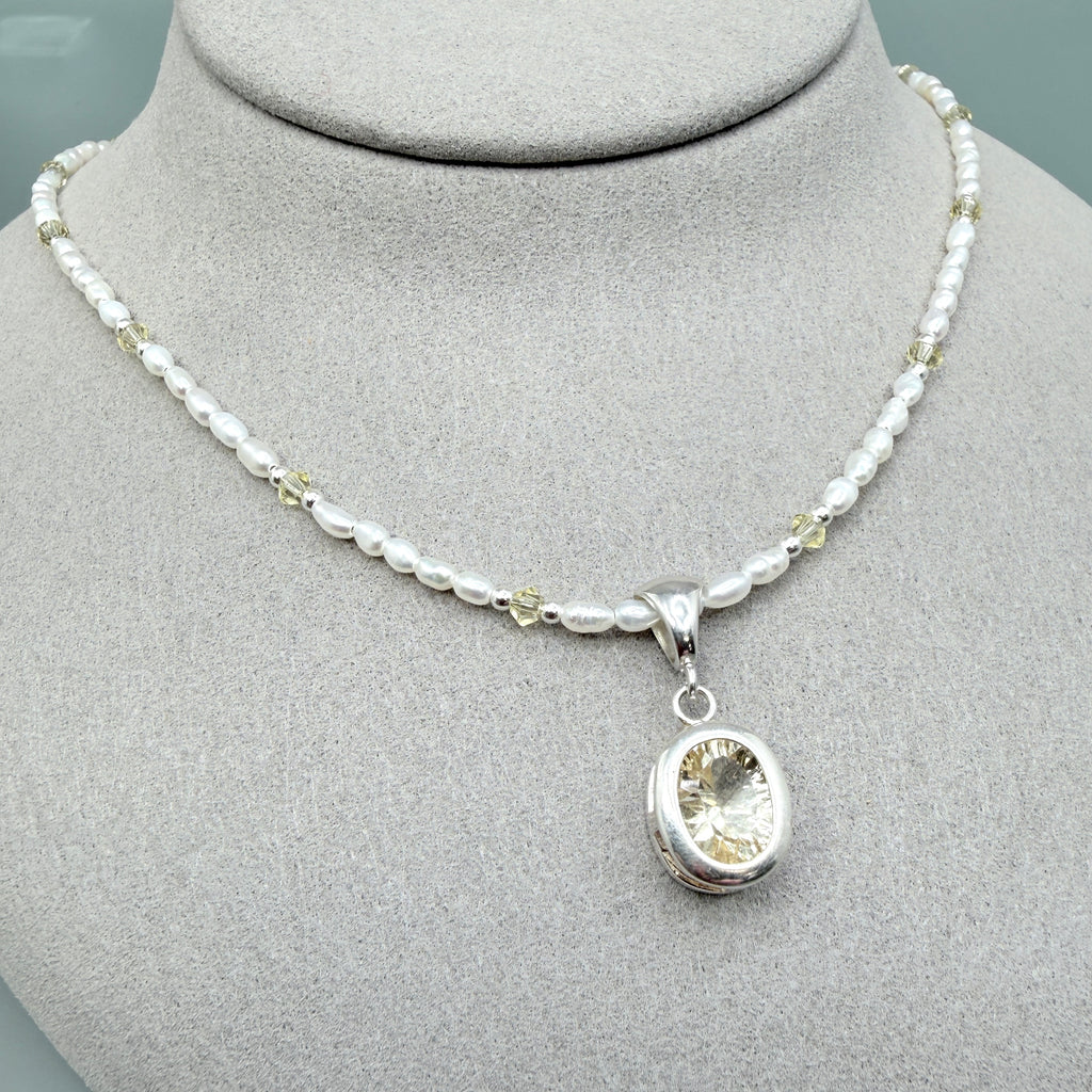 Pale yellow Labradorite with pearls and crystals