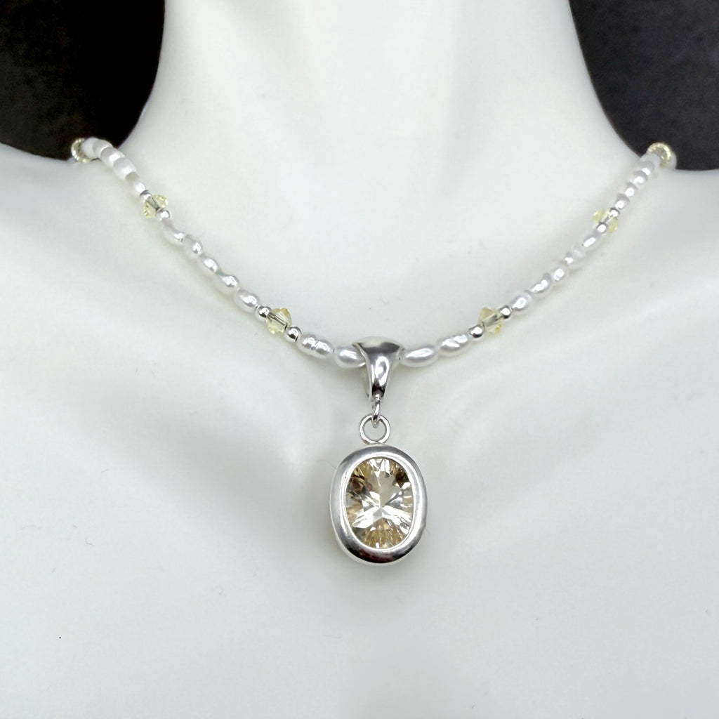 Pale yellow Labradorite with pearls and crystals