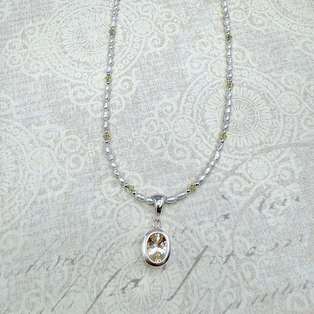 Pale yellow Labradorite with pearls and crystals