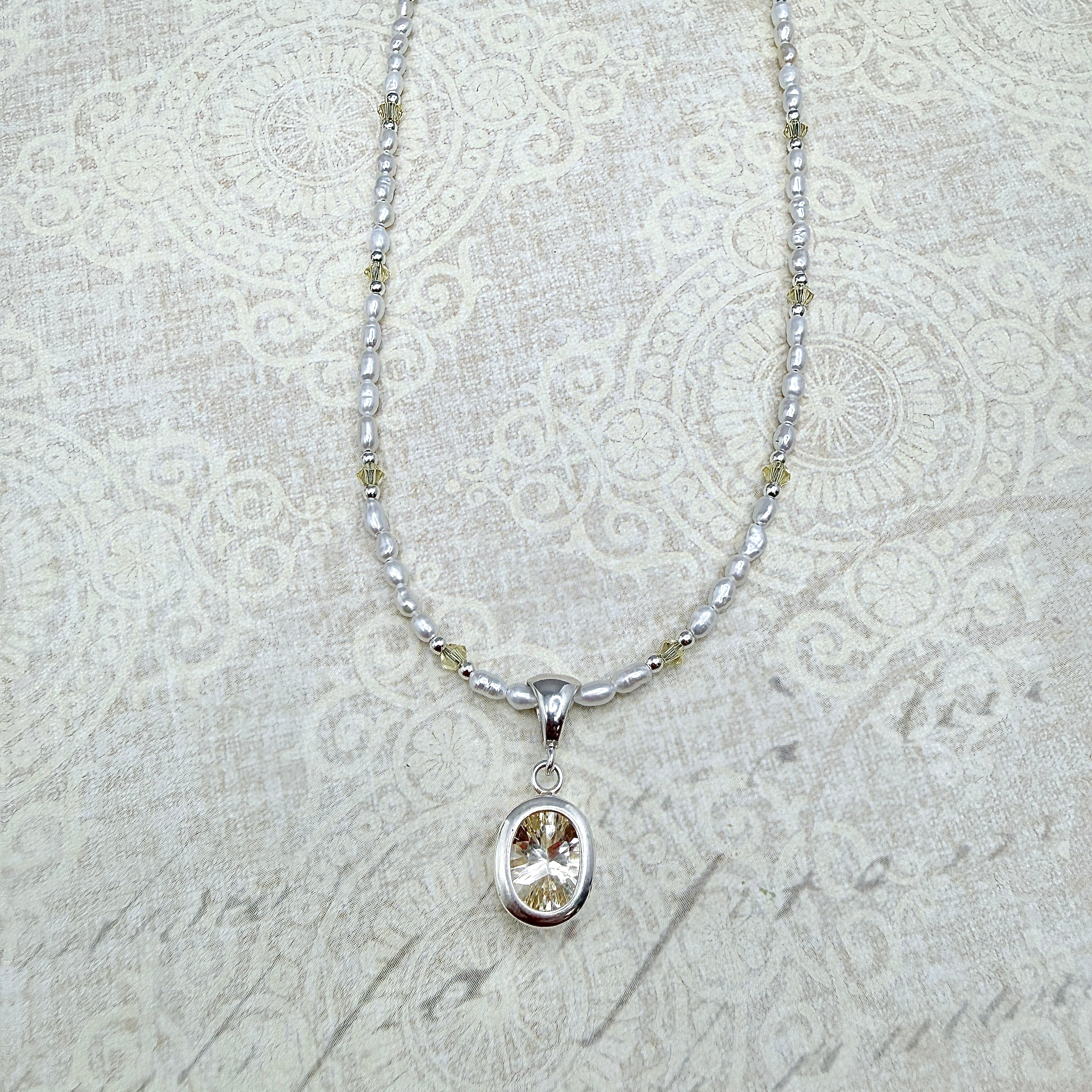 Pale yellow Labradorite with pearls and crystals