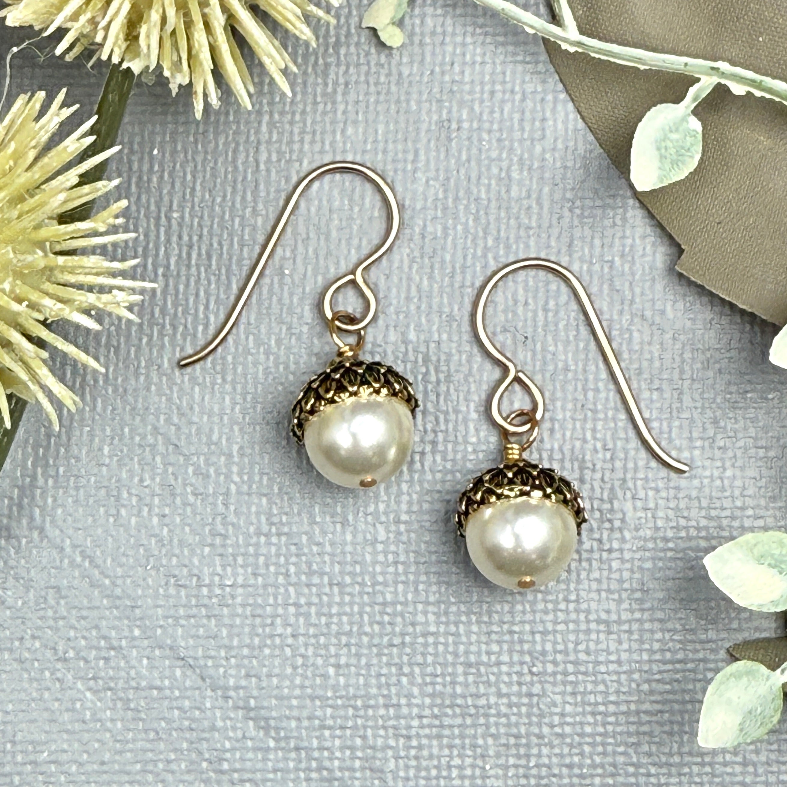Ivory and gold acorn earrings