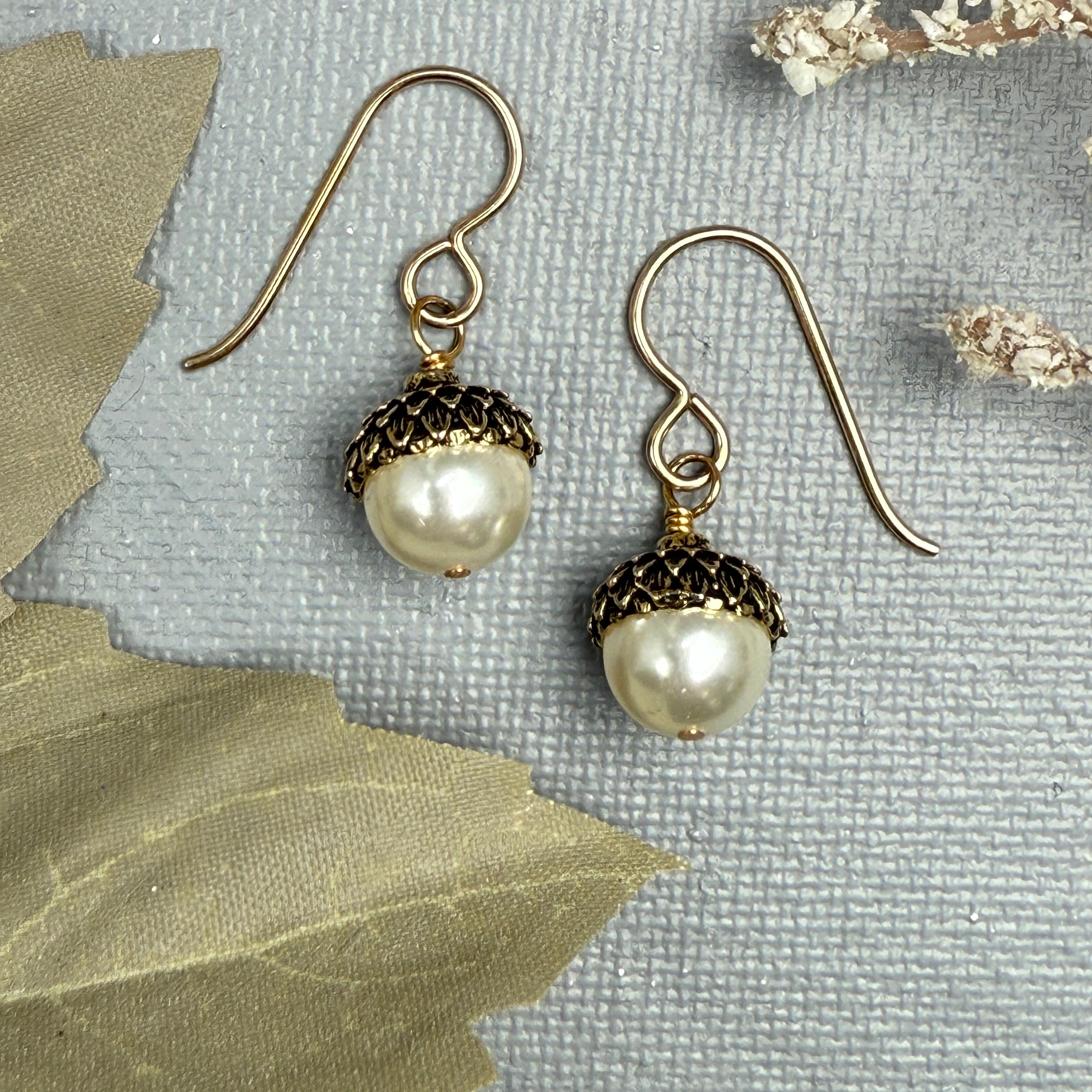 Ivory and gold acorn earrings